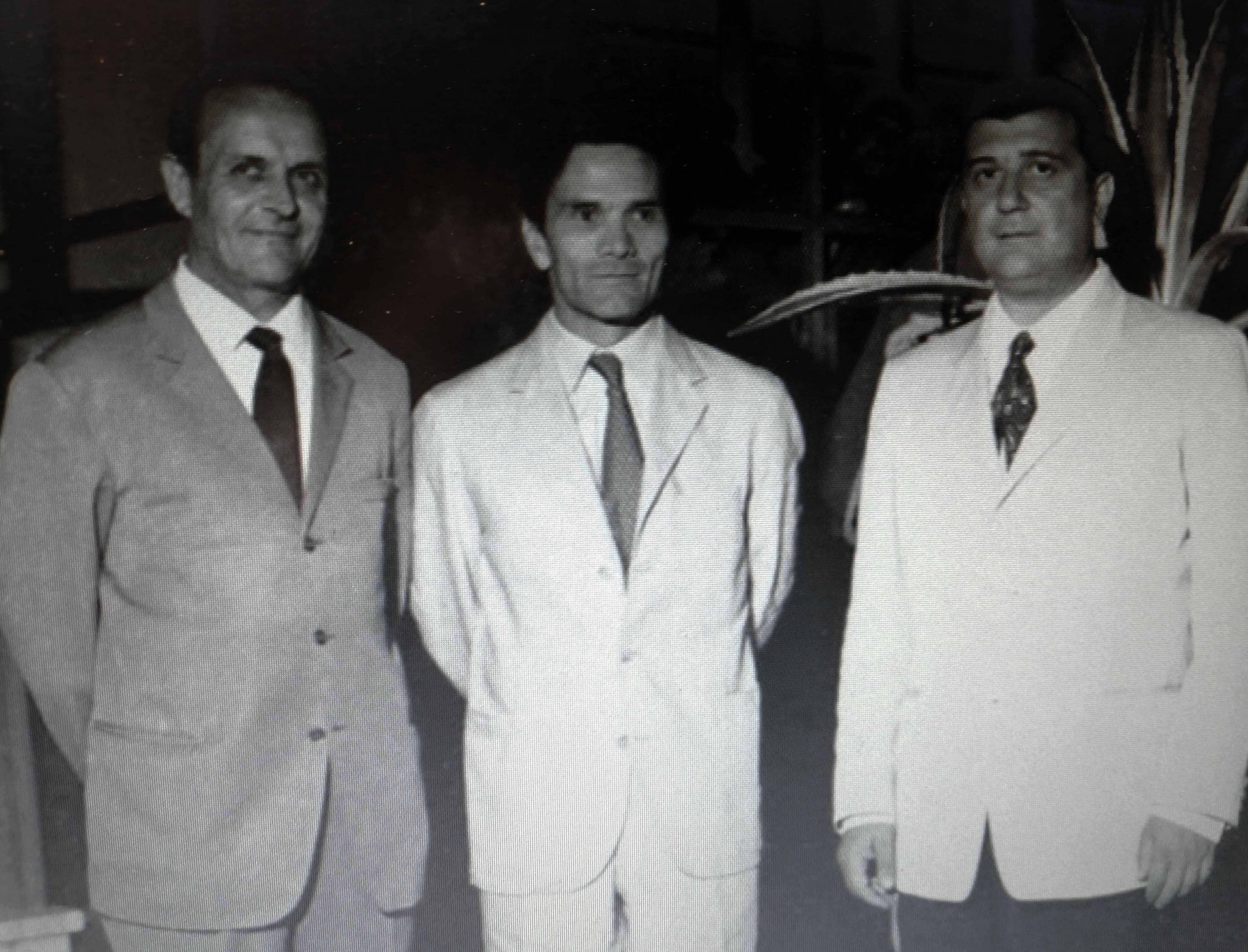 Foto di Epimaco 'Pico' Zangheri che ritrae Pier Paolo Pasolini con Biagio Cenni e il presidente dell’Azienda di Soggiorno, Giuseppe Mingozzi.